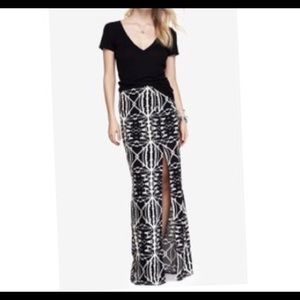 Express maxi skirt with zipper on side and slit.